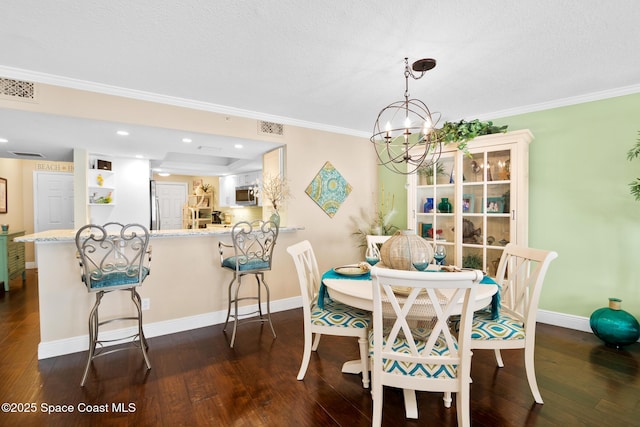 dining space with dark wood-style flooring, visible vents, and baseboards