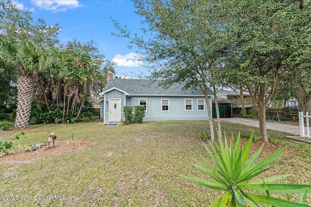 exterior space with a front lawn