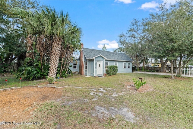 exterior space featuring a front lawn