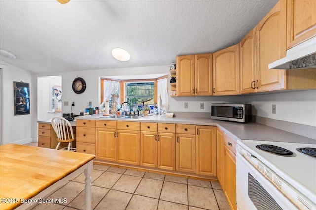 kitchen with sink, white electric range, light tile patterned floors, and a textured ceiling