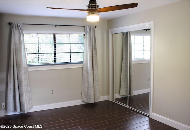 unfurnished bedroom featuring a closet and ceiling fan