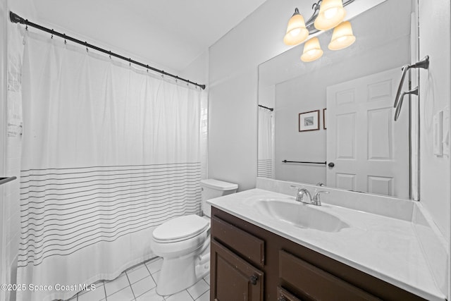 bathroom featuring vanity, curtained shower, tile patterned floors, and toilet