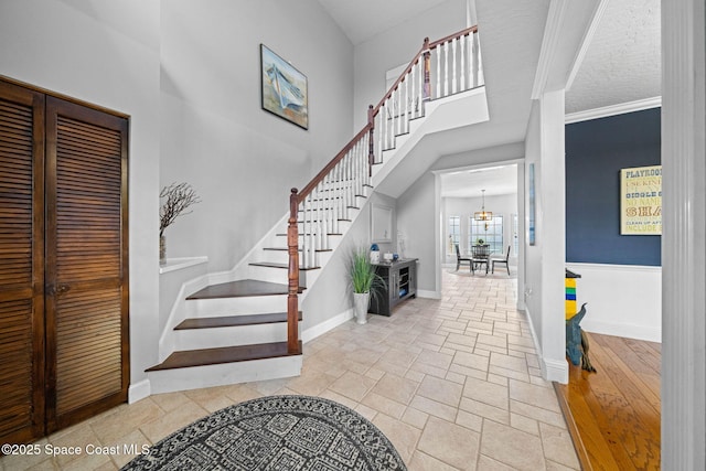 entrance foyer with an inviting chandelier