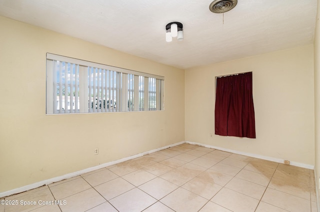 view of tiled empty room