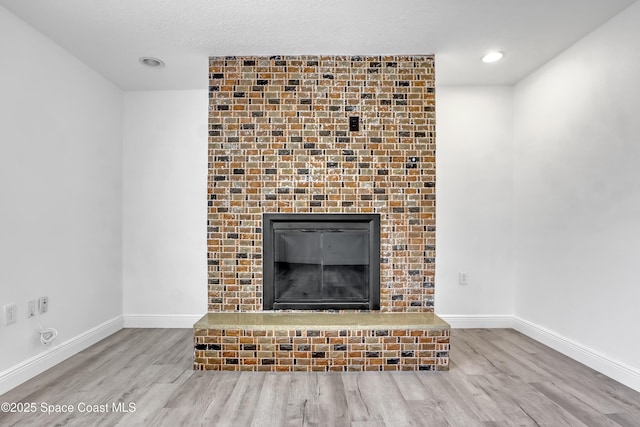 282 Hollywood Blvd, Melbourne, FL 32904 - interior details with wood-type flooring and a fireplace