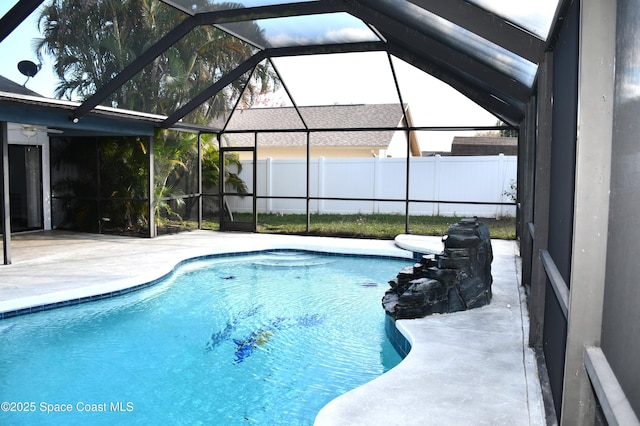 view of pool featuring a lanai and a patio area