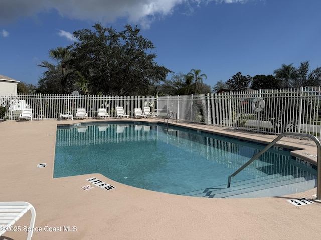 1235 White Oak Cir, Melbourne, FL 32934 - view of swimming pool with a patio