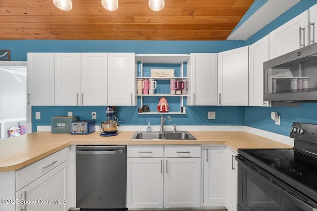 kitchen with wooden ceiling, appliances with stainless steel finishes, sink, and white cabinets