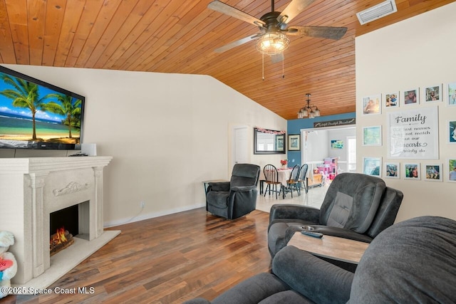 living room featuring lofted ceiling, wooden ceiling, ceiling fan, a premium fireplace, and hardwood / wood-style floors