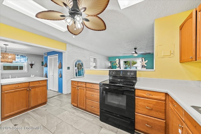 kitchen with lofted ceiling, black electric range oven, ceiling fan, a textured ceiling, and decorative light fixtures