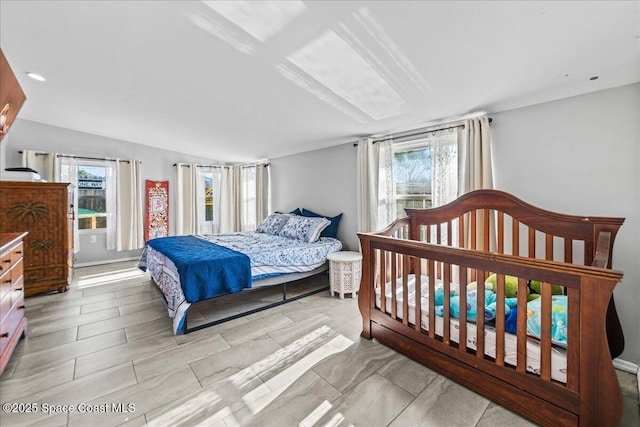 bedroom with lofted ceiling