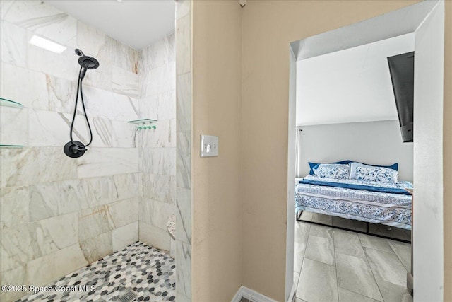 bathroom featuring tiled shower