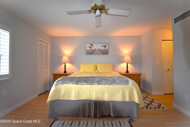 bedroom featuring a closet, ceiling fan, and light wood-type flooring