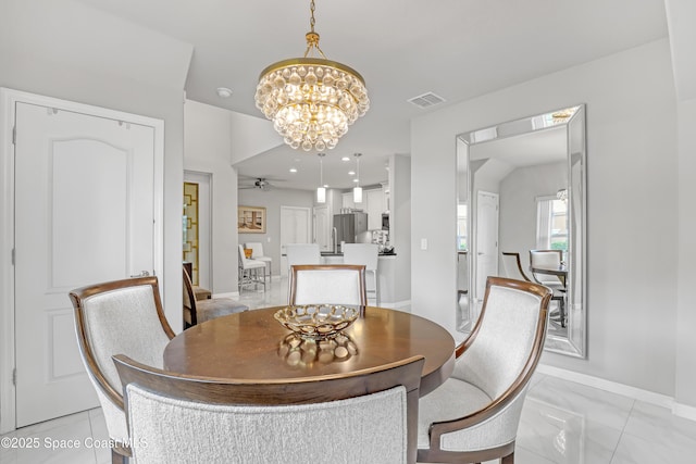 dining space featuring recessed lighting, visible vents, ceiling fan with notable chandelier, and baseboards