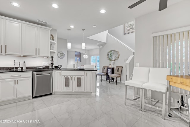 kitchen with visible vents, open shelves, a sink, dishwasher, and dark countertops