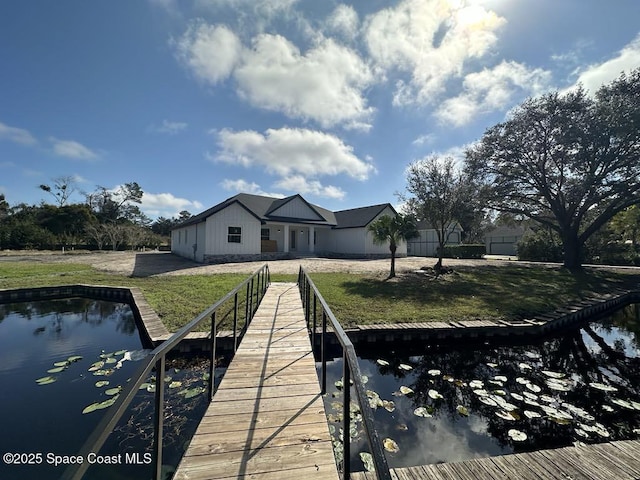 dock area with a yard