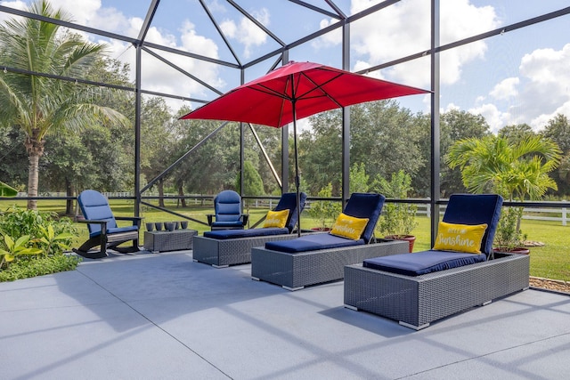 view of patio featuring an outdoor living space and a lanai