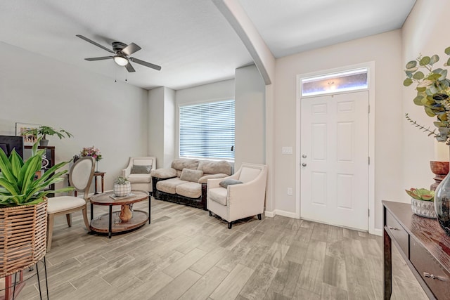 foyer featuring ceiling fan and light hardwood / wood-style floors