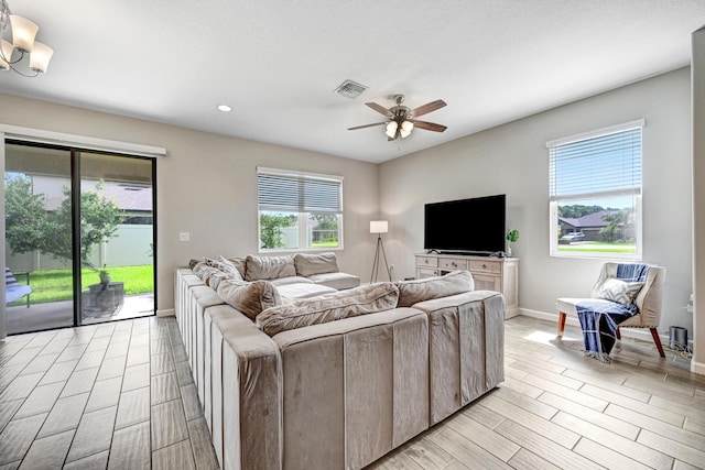 living room with ceiling fan