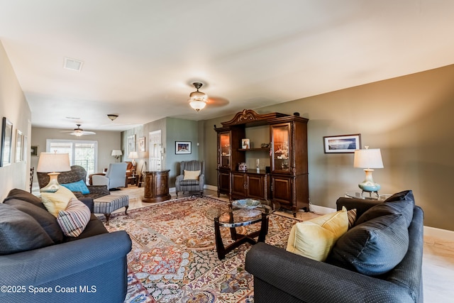 living room with ceiling fan