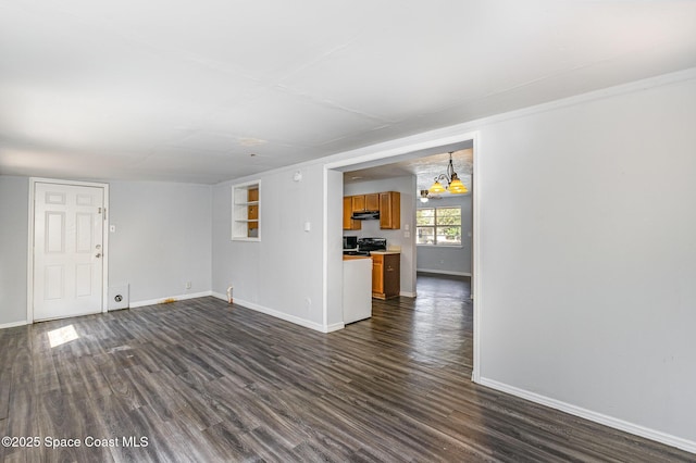 unfurnished living room with dark wood-type flooring