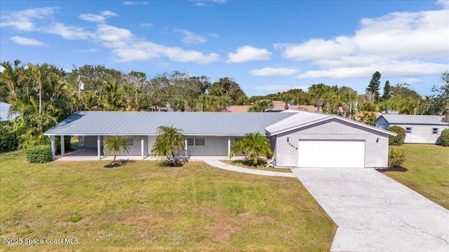 ranch-style house with a garage and a front lawn