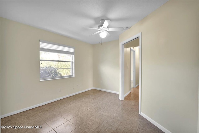 empty room featuring ceiling fan