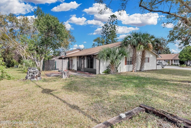 view of front of property with a front lawn