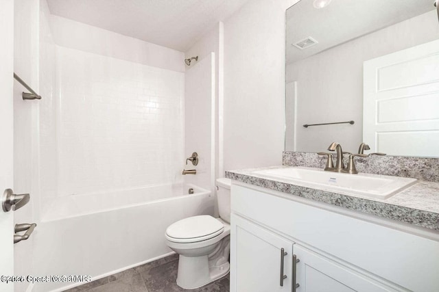 full bathroom featuring shower / bathing tub combination, vanity, tile patterned floors, and toilet