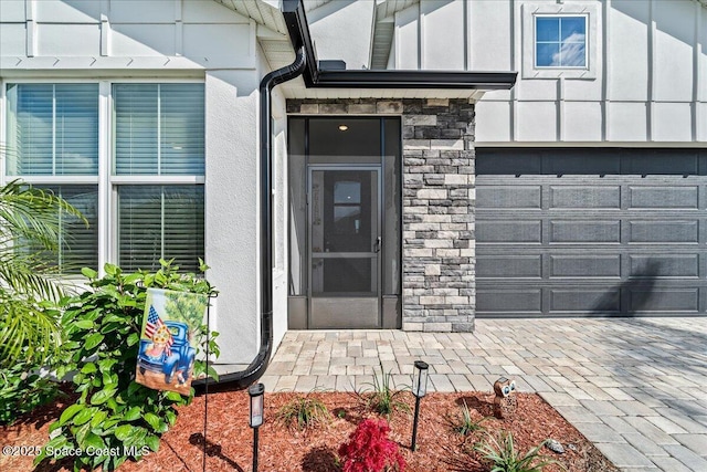 property entrance with a garage