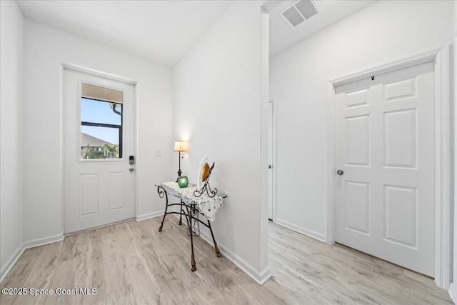 entrance foyer featuring light hardwood / wood-style floors