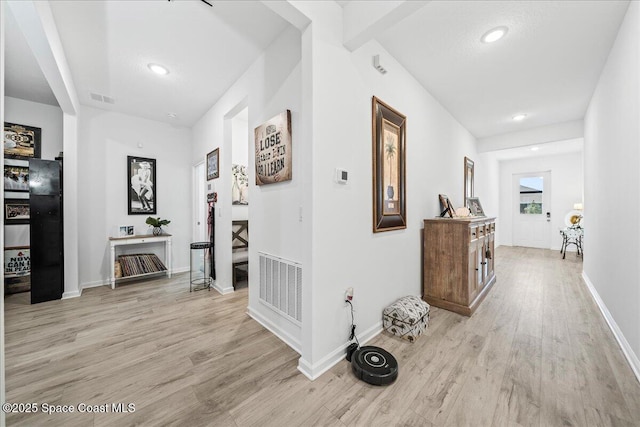 hall featuring light hardwood / wood-style floors