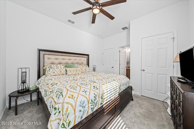 bedroom featuring light carpet and ceiling fan