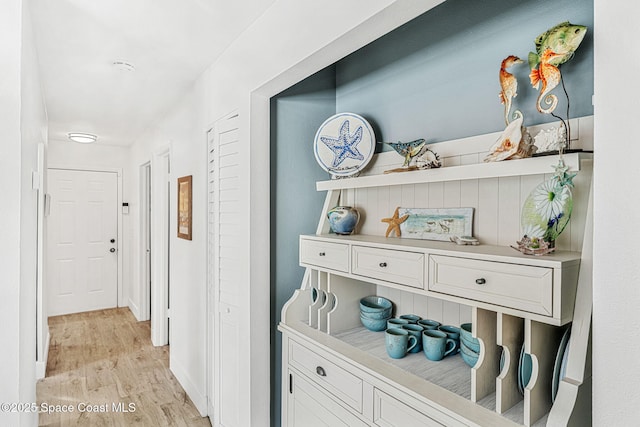 hallway featuring light wood-type flooring