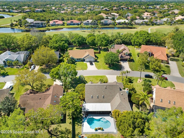 aerial view featuring a residential view and a water view