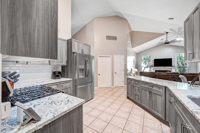 kitchen featuring visible vents, gray cabinets, a ceiling fan, and stainless steel refrigerator with ice dispenser