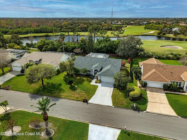 drone / aerial view with a water view