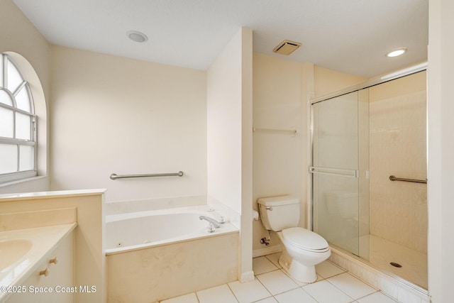 full bathroom featuring independent shower and bath, tile patterned floors, and toilet