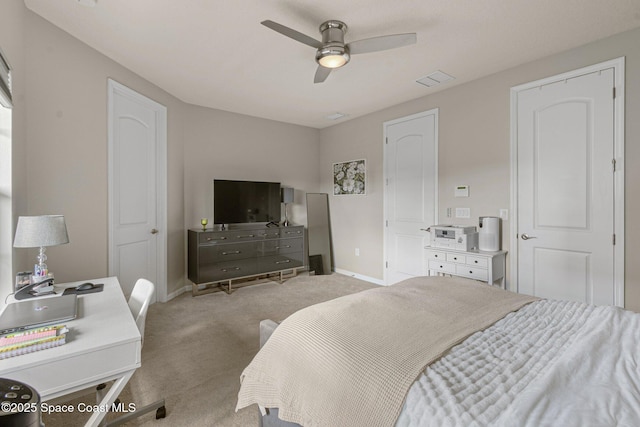 carpeted bedroom with ceiling fan