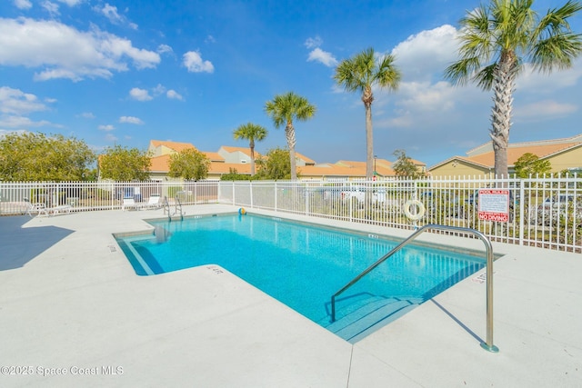 view of pool featuring a patio area