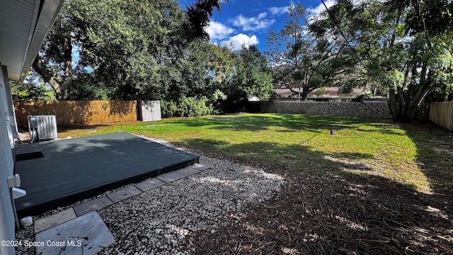 view of yard with a deck