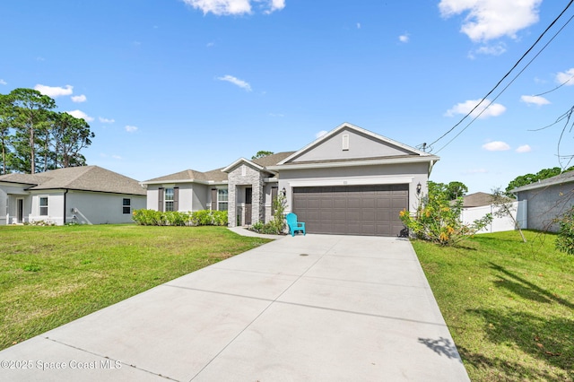 single story home with a garage and a front lawn