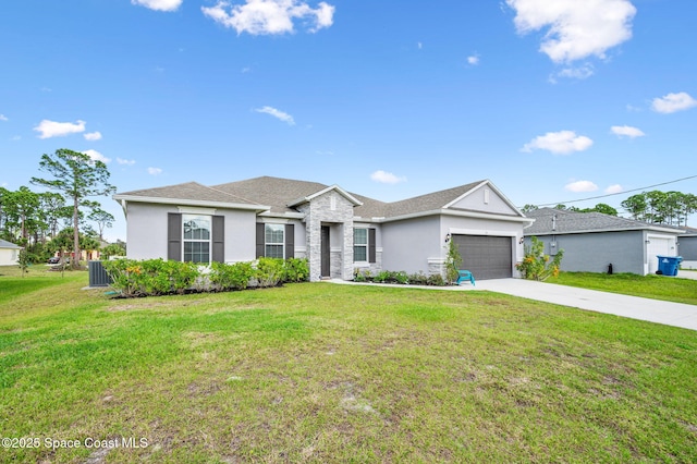 single story home featuring a garage and a front lawn