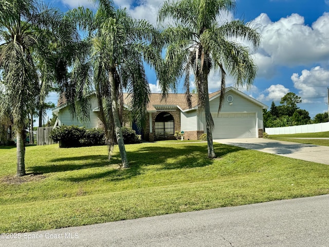 single story home with a garage and a front lawn