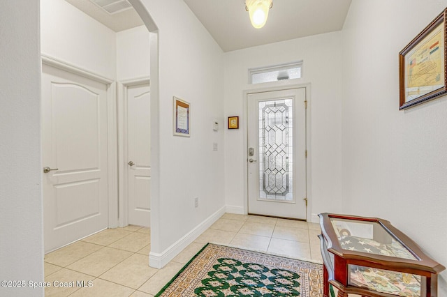 entrance foyer featuring light tile patterned floors