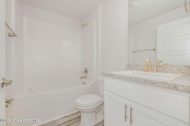 bathroom with visible vents, toilet, wood finished floors, bathtub / shower combination, and vanity