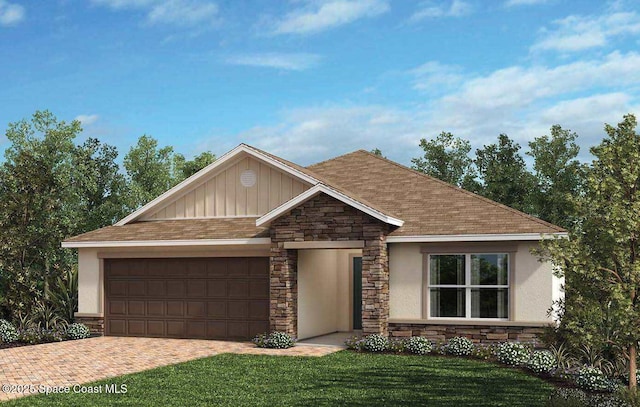 view of front facade featuring a garage and a front lawn