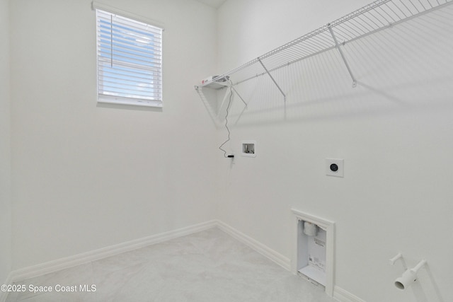 416 Glaspell Cir SE, Palm Bay, FL 32909 - laundry area featuring washer hookup, electric dryer hookup, and light carpet