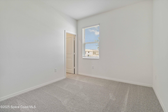 416 Glaspell Cir SE, Palm Bay, FL 32909 - empty room with light carpet