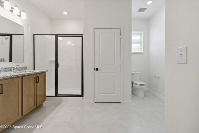 416 Glaspell Cir SE, Palm Bay, FL 32909 - bathroom featuring vanity, a shower stall, and tile patterned flooring